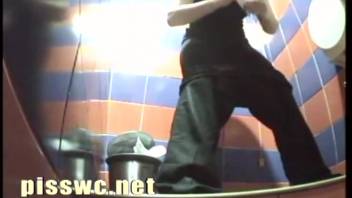 Woman defecating in the bathroom